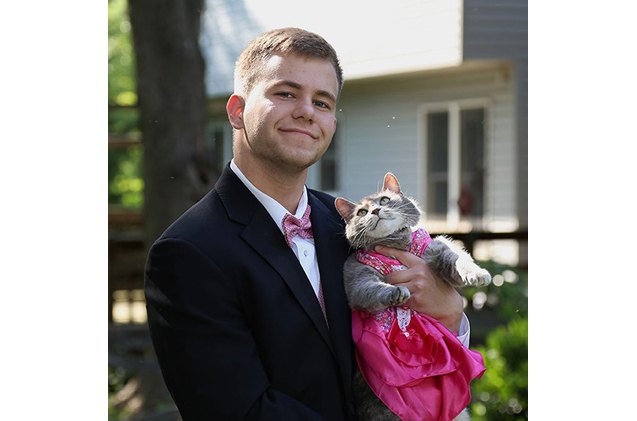 teen takes his cat to the purrom